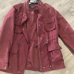 Light weight utility jacket with zipper and pocket details